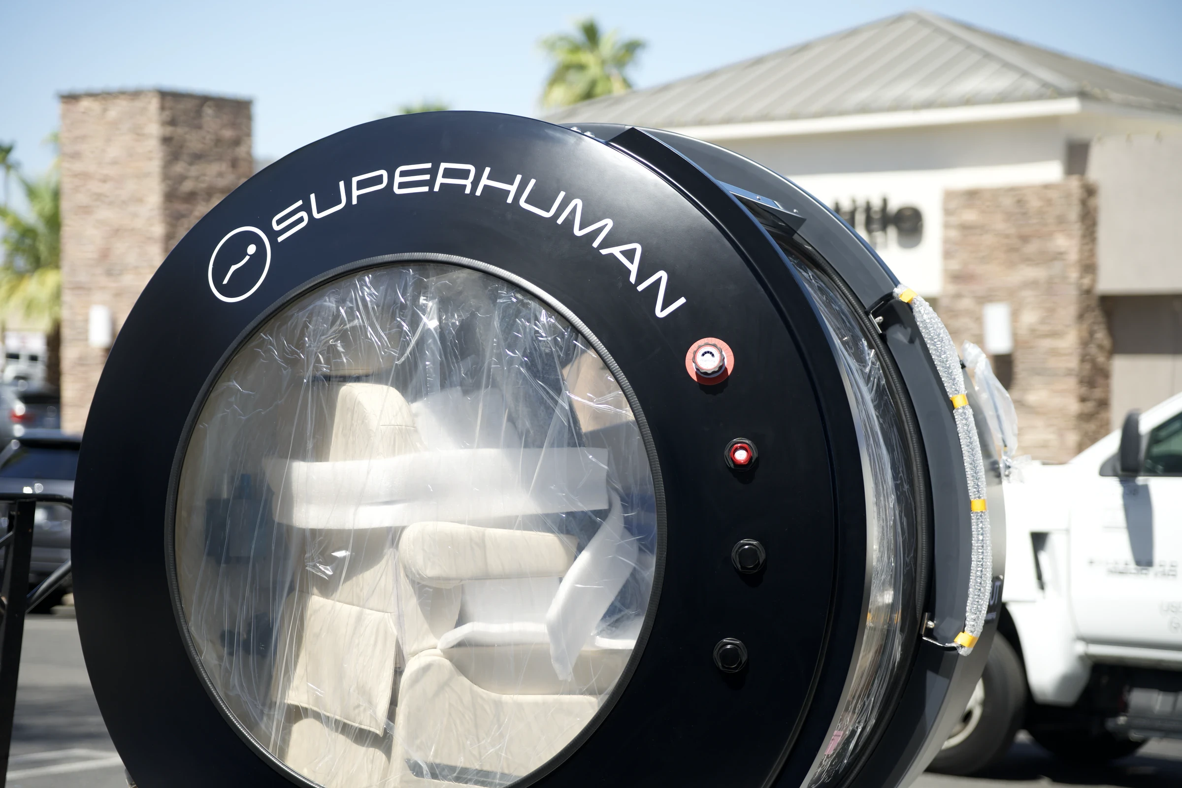 A new Superhuman chamber, still in protective wrap, arriving on site for install